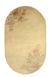 Vintage Chinese Deco rug, 89x55 inches (225x140 cm), featuring delicate coral chrysanthemums with sage leaves on a serene golden oval background